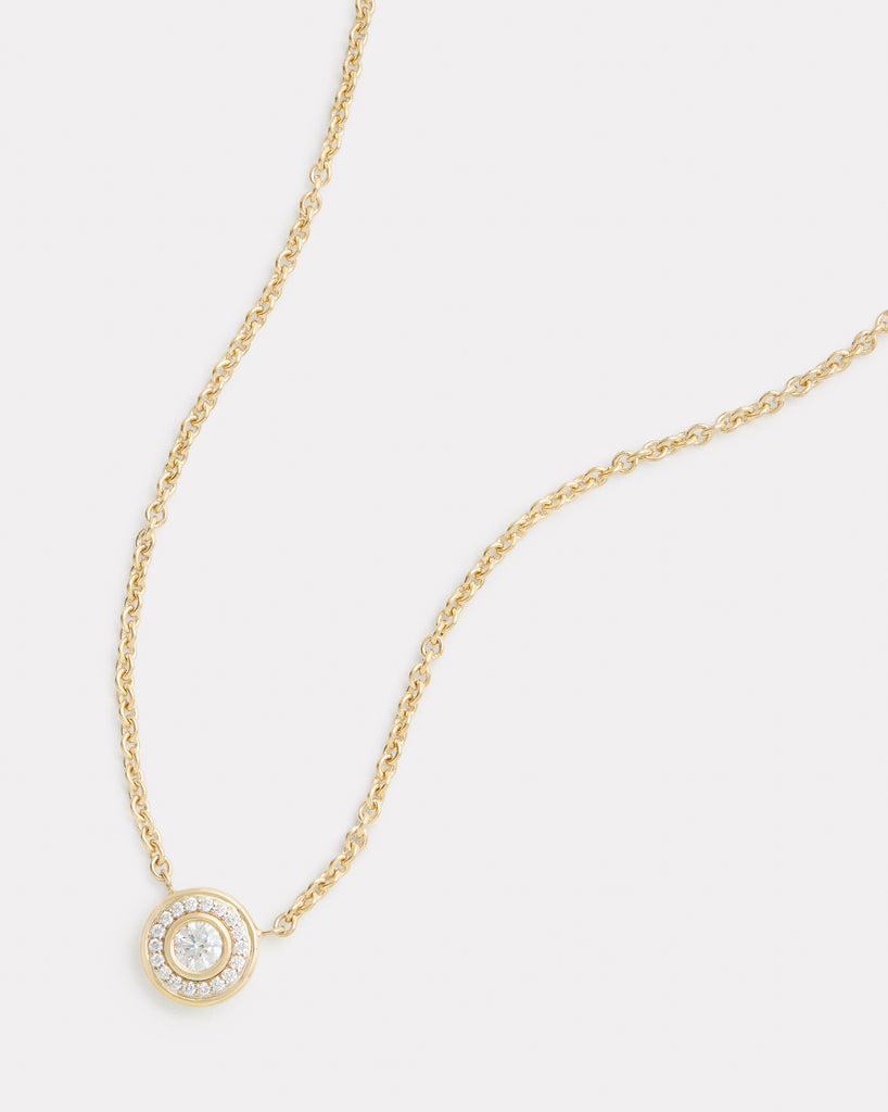 Yellow and White Gold Round Diamond Pendant with Pave Surround