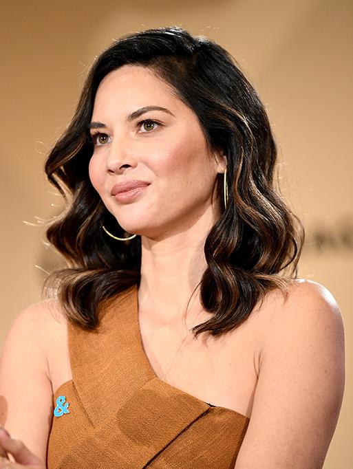 Olivia Munn wearing the Twisted Hoops