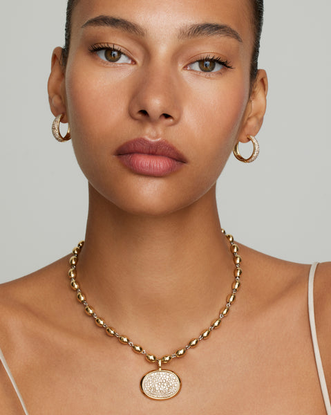 Yellow and White Gold Oval Beaded Necklace with Champagne Diamond Pendant