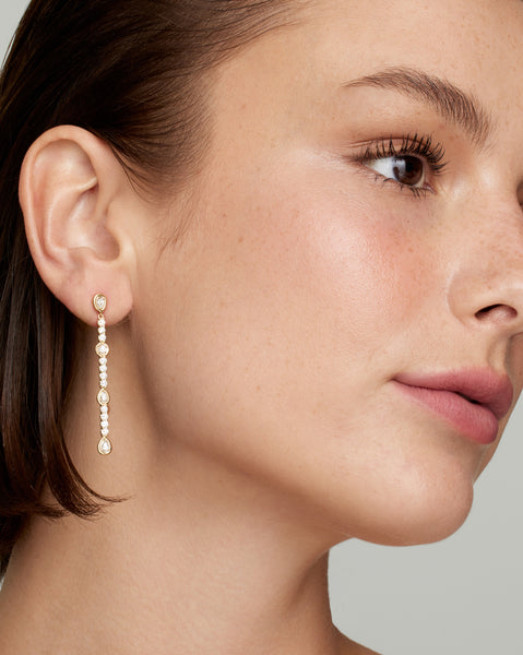 Yellow and White Gold Long Drop Earrings with Pear Shape and Round Diamonds