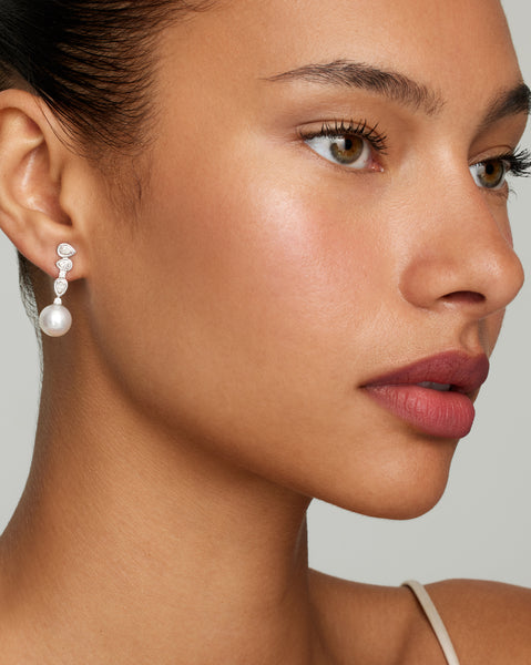 Asymmetrical Round and Pear Shape Diamond Studs with South Sea Pearls Drop