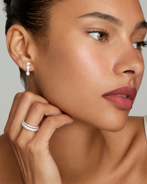 Asymmetrical Round and Pear Shape Diamond Studs