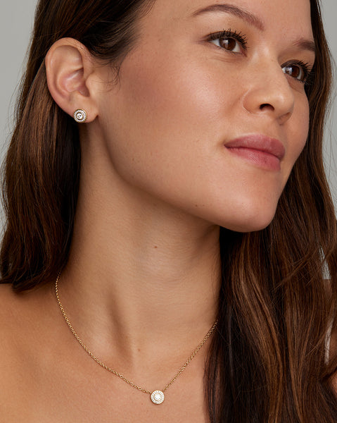 Yellow and White Gold Round Diamond Pendant with Pave Surround