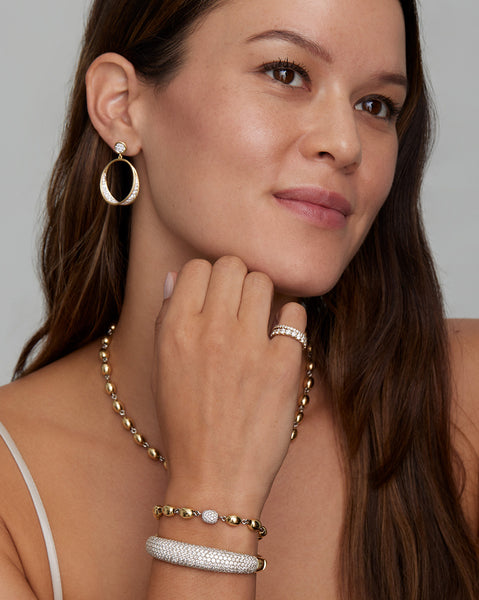 Yellow and White Gold Domed Hinged Bangle with Pave Diamonds