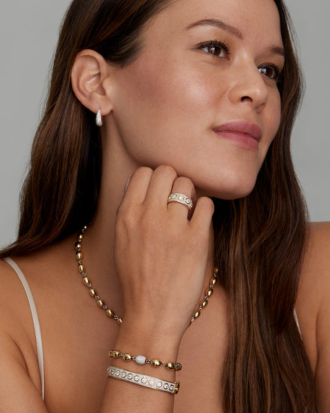 Yellow and White Gold Hinged Bangle with Bezel Set Diamonds and Pave Diamonds