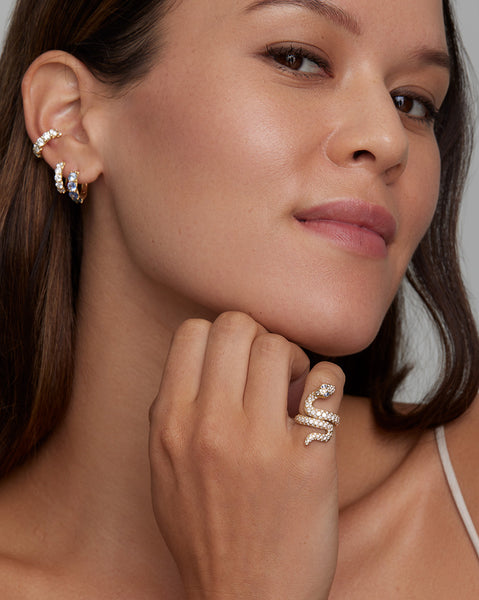 Diamond Snake Ring with Light Blue Sapphire Eyes