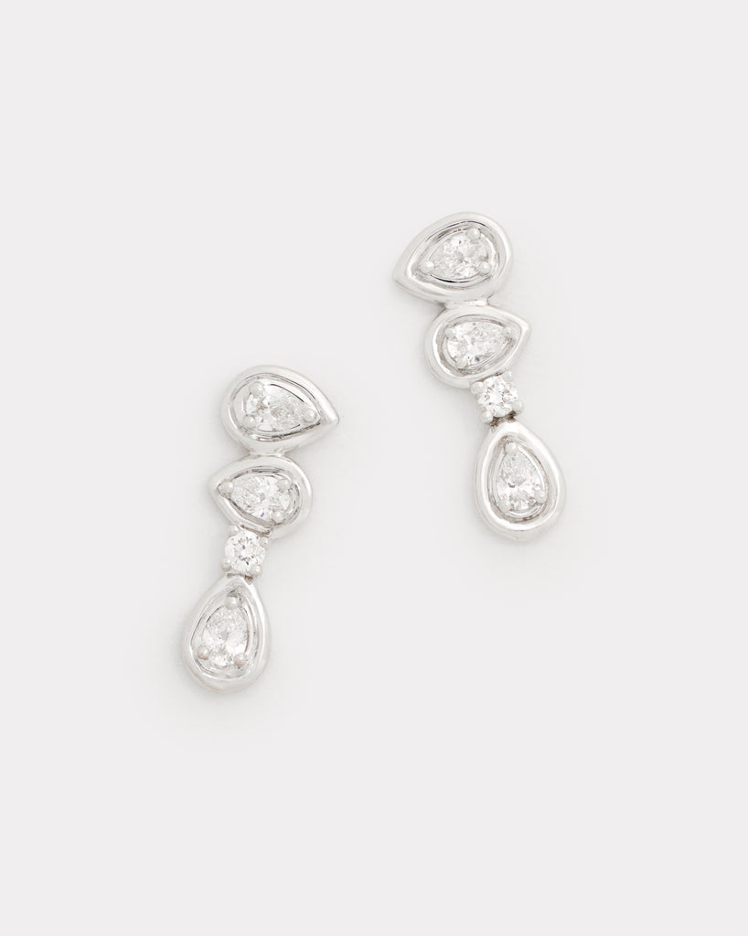 Asymmetrical Round and Pear Shape Diamond Studs