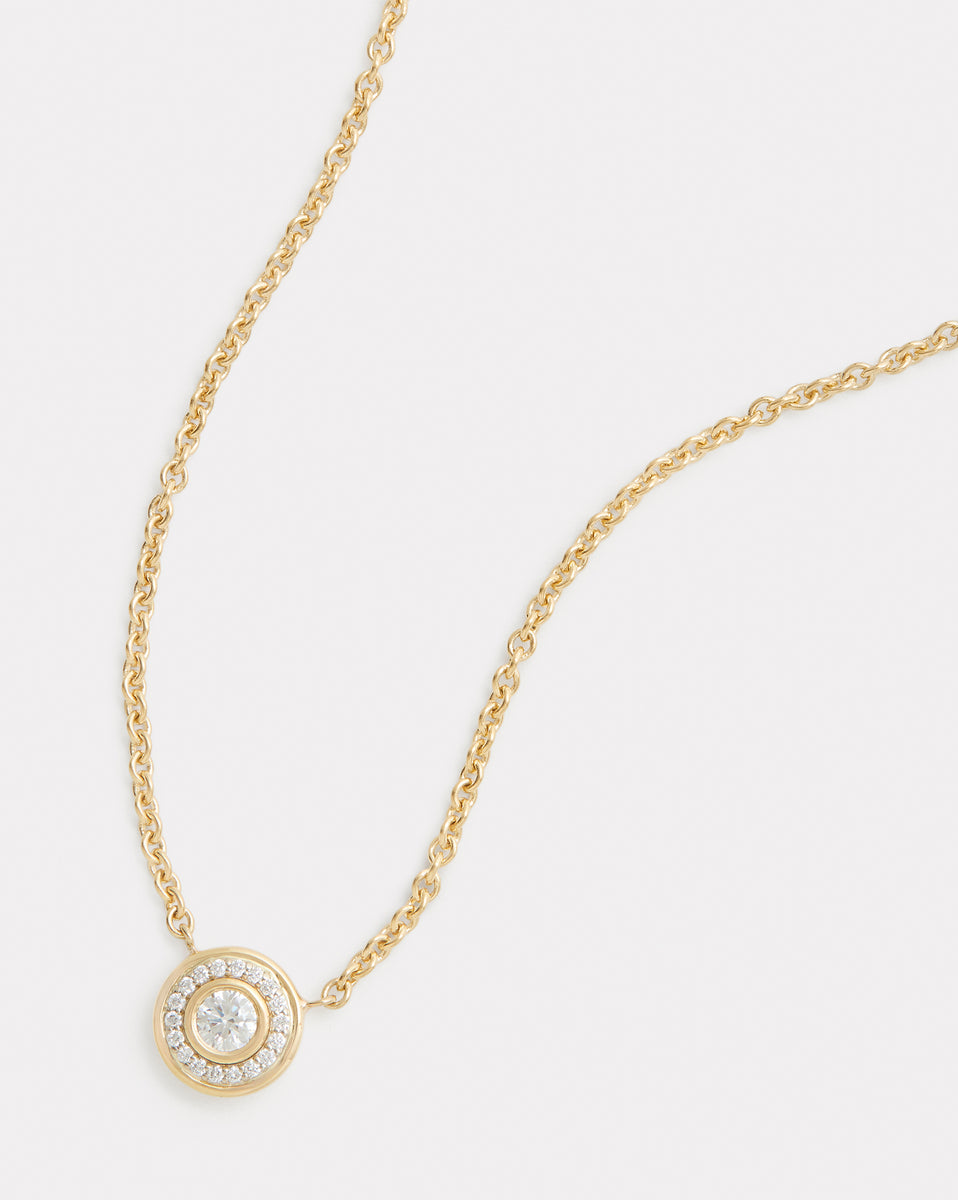 Yellow and White Gold Round Diamond Pendant with Pave Surround