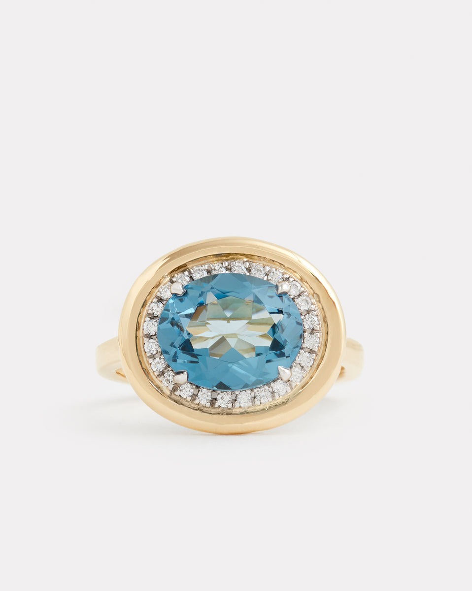 Yellow and White Gold Ring with Oval Shape London Blue Topaz and Diamonds