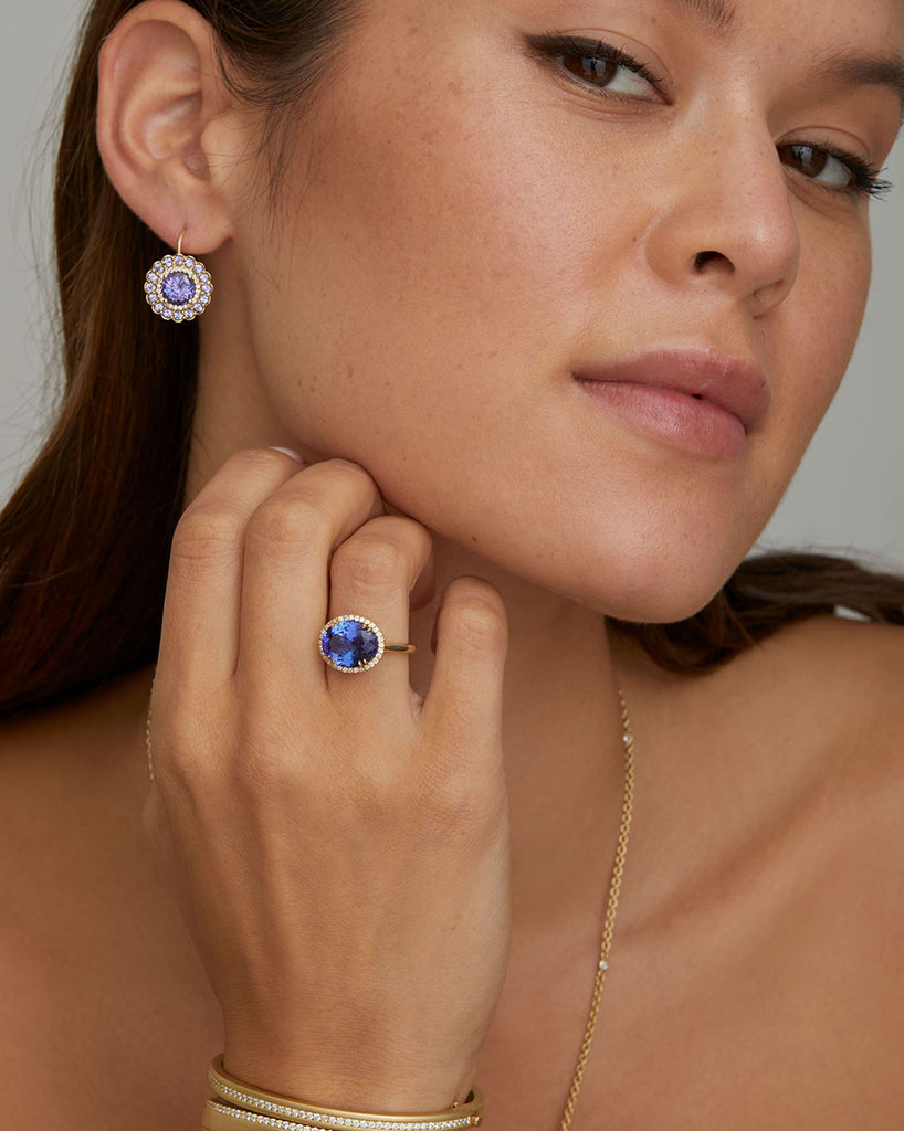 Tanzanite oval ring with diamonds top